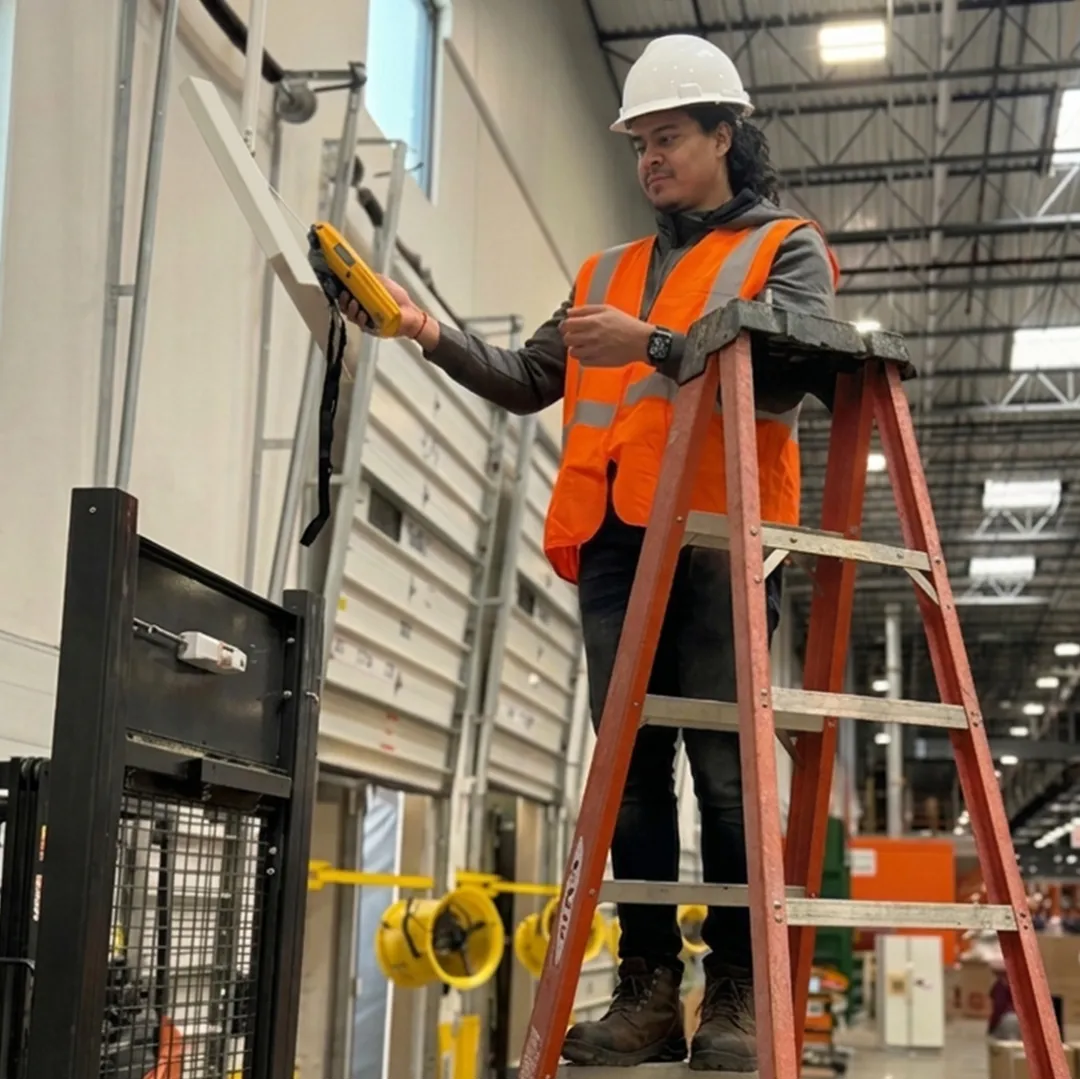 Field Tech technician on-site at a commercial installation