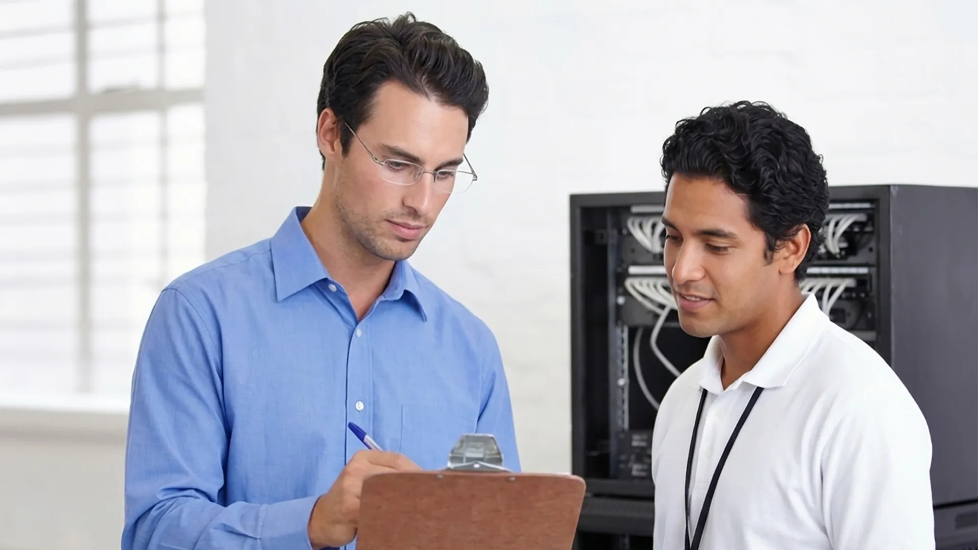 Business owners reviewing their security camera footage