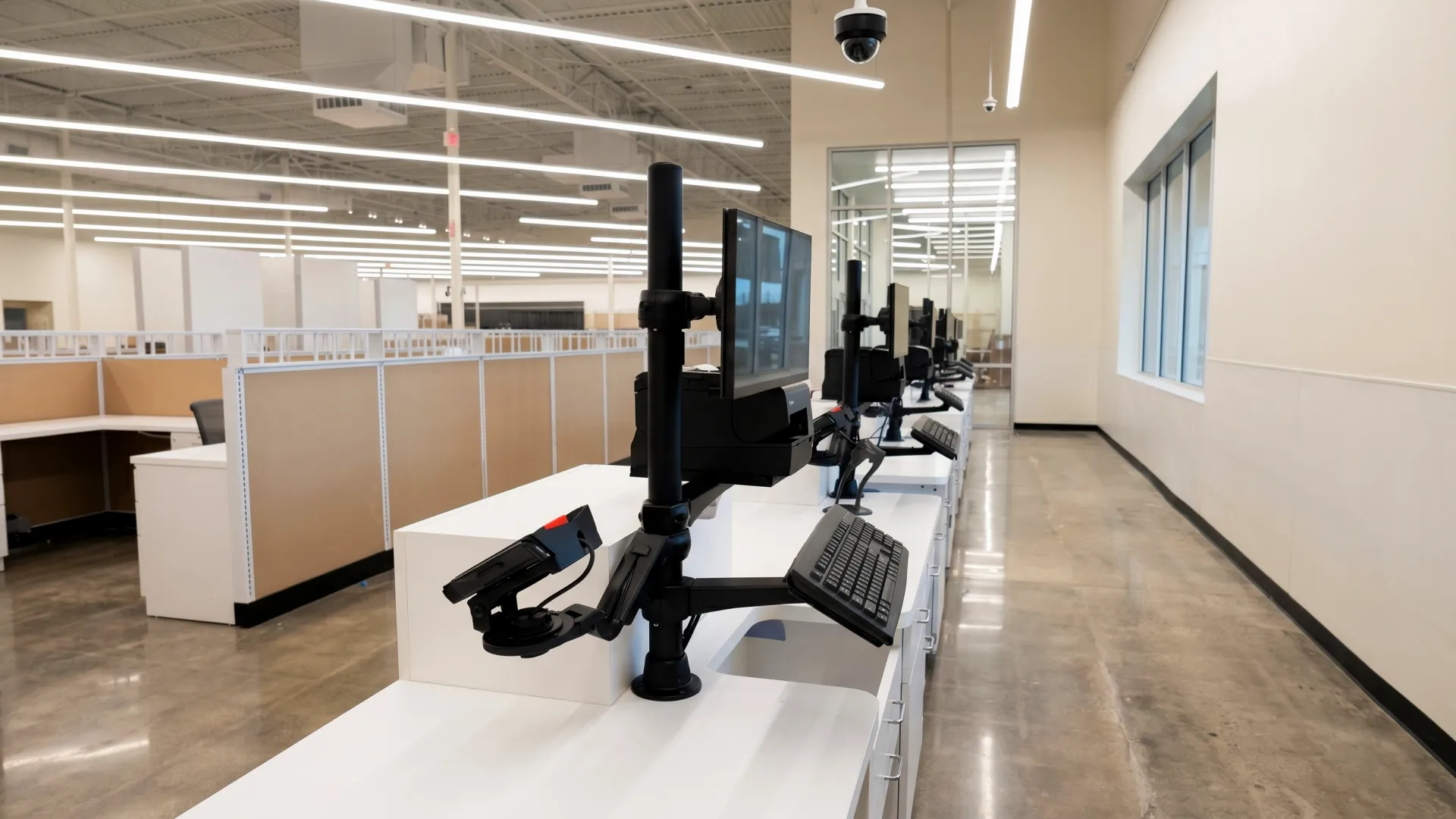 Clean Field Tech client install — monitoring stations under a ceiling-mounted security camera